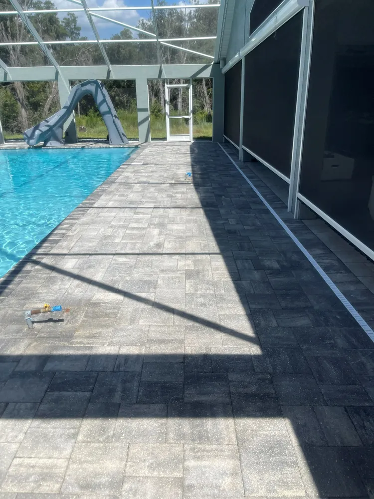 Pool deck pavers after cleaning and natural matte sealing, Polk County FL