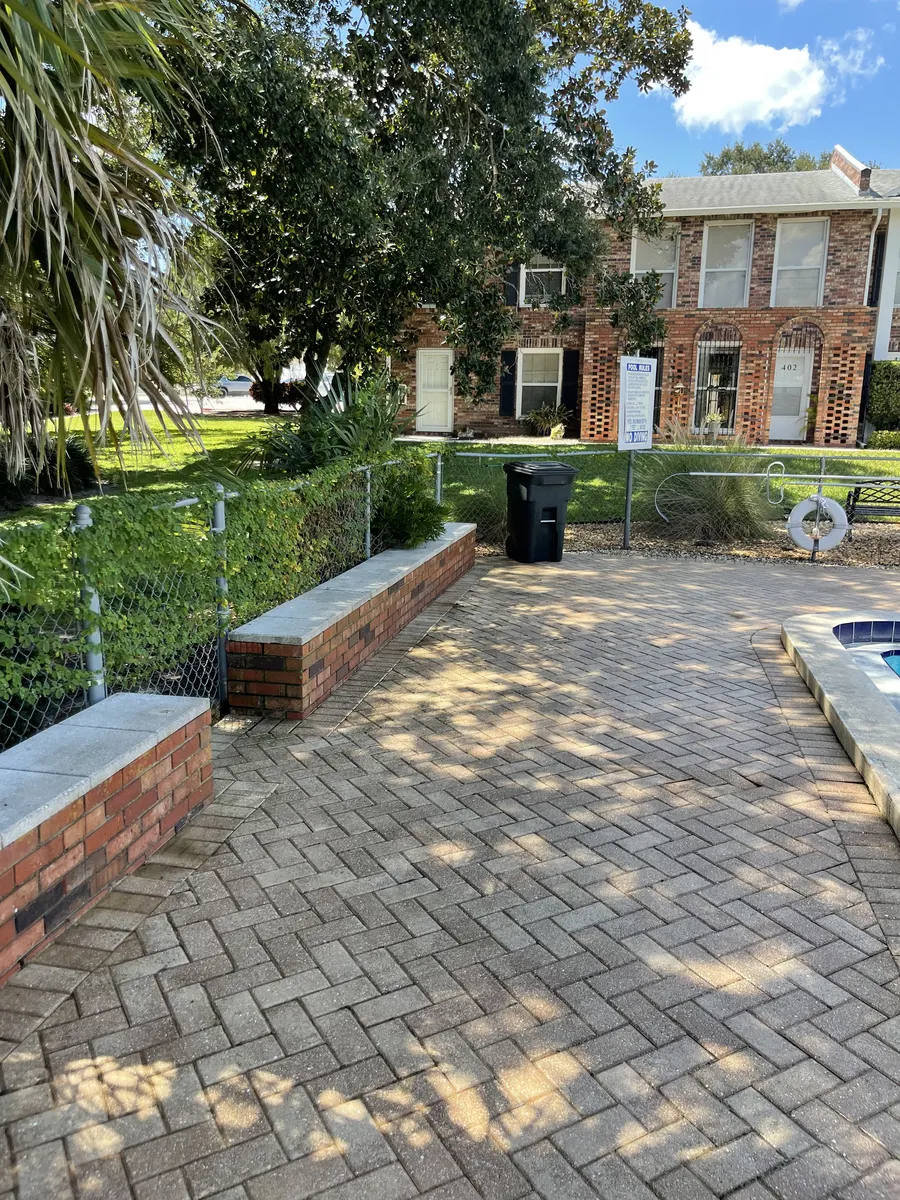 Paver pool area after commercial pressure washing service, Polk County FL