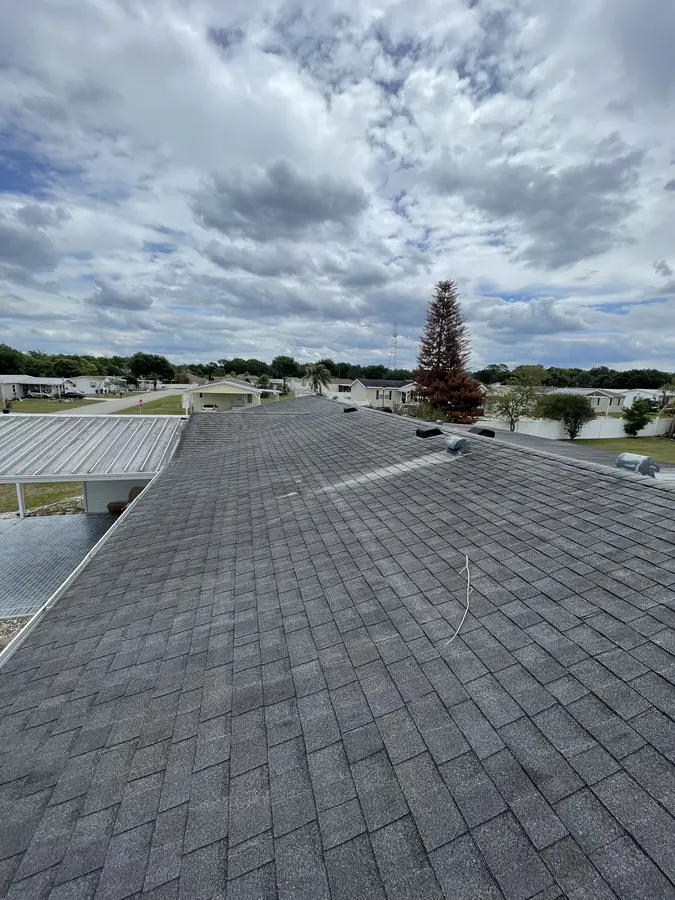 Shingle roof after soft wash — algae and black streaks fully removed